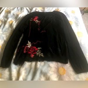 Light knitted sweater 
Floral embroidery and lace